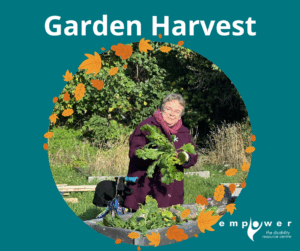 An Empower N L member harvests produce from an accessible garden bed. Title reads Garden Harvest. The Empower N L Logo is in the lower right corner.